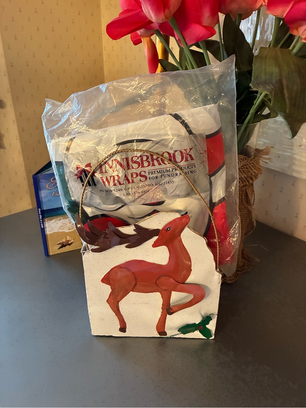 1 holiday tin basket and 1 INNISBROOK wrap SANTA single door cover.